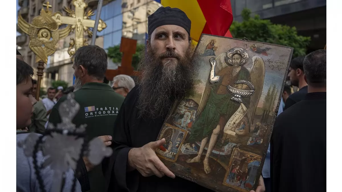 Religinė procesija // Nuotr. AP/Andreea Alexandru